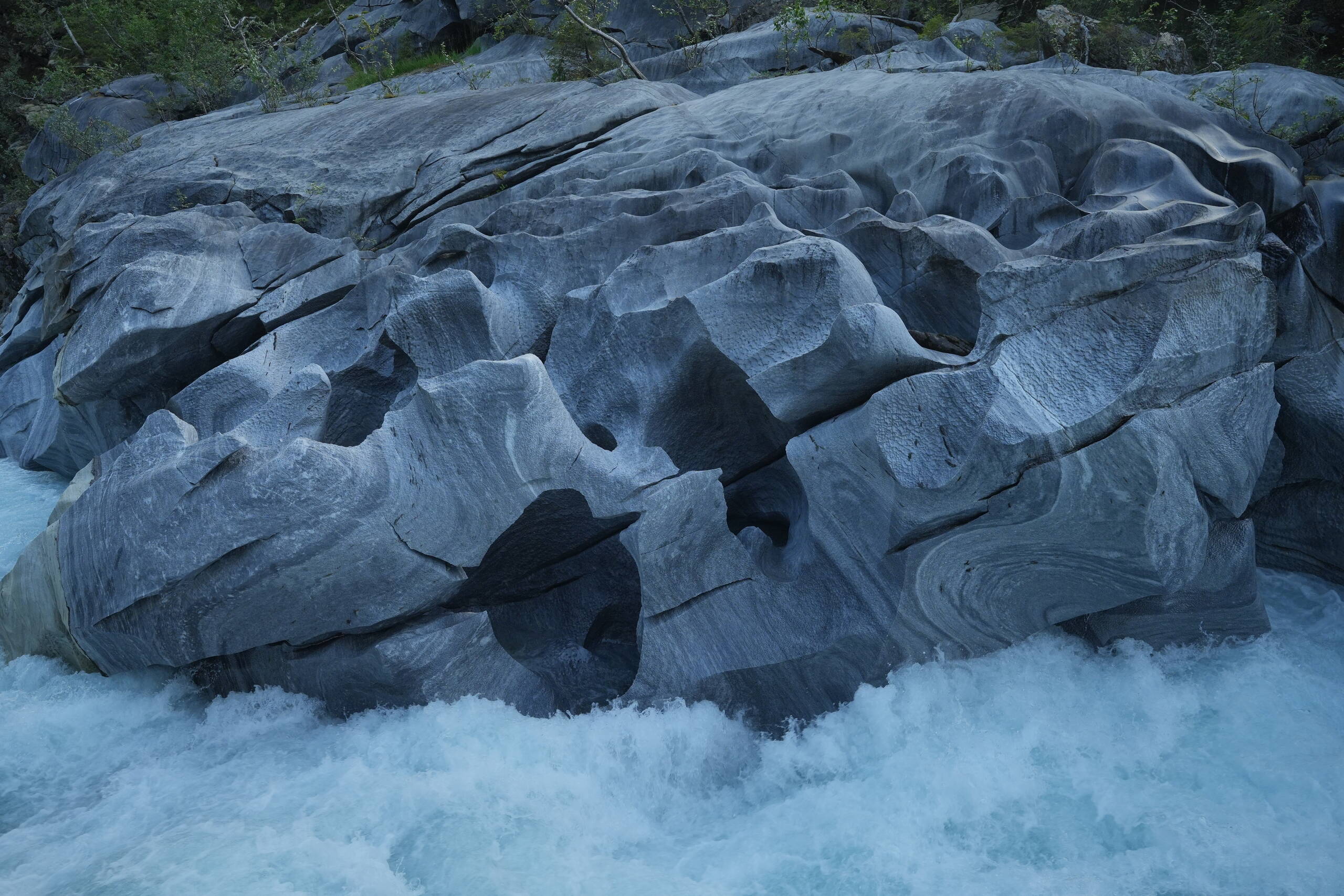 An image of rocks with holes.